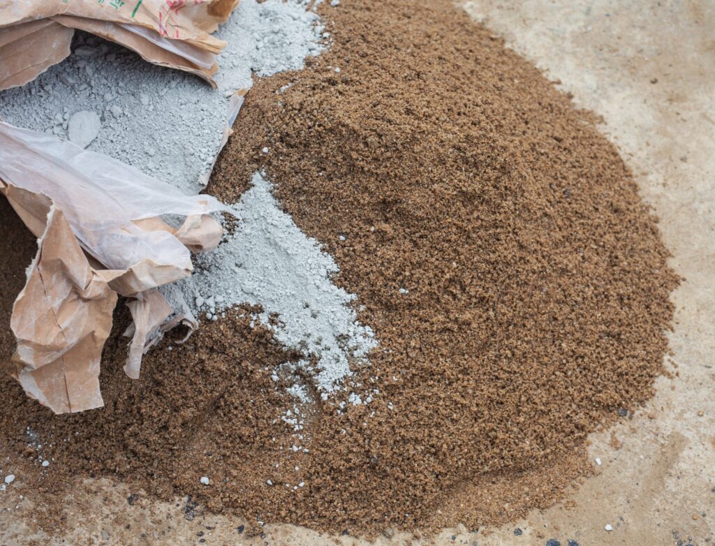construction technicians are mixing cement stone sand construction ret