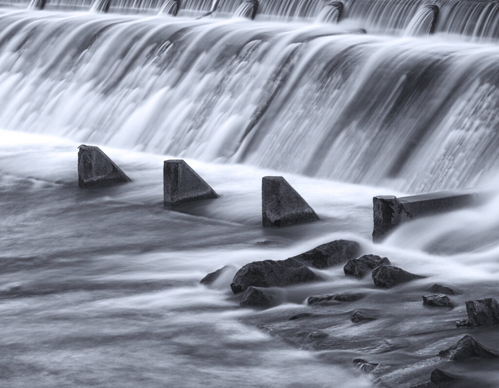 long exposure beautiful shot of the lech river dam in reutte